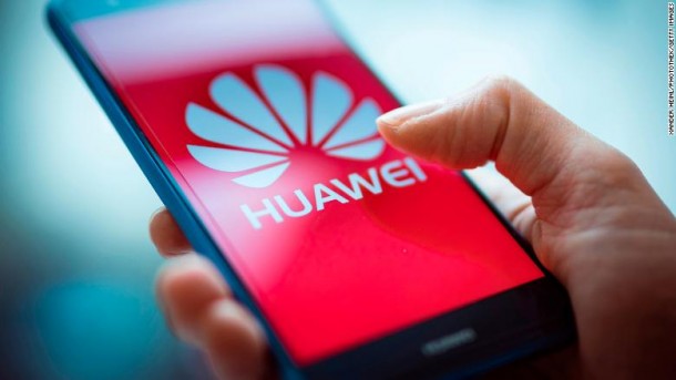 BERLIN, GERMANY - JANUARY 15: A Woman holding a mobile device with a Huawei logo is seen in this photo illustration on January 15, 2019.(Photo by Xander Heinl/Photothek via Getty Images)